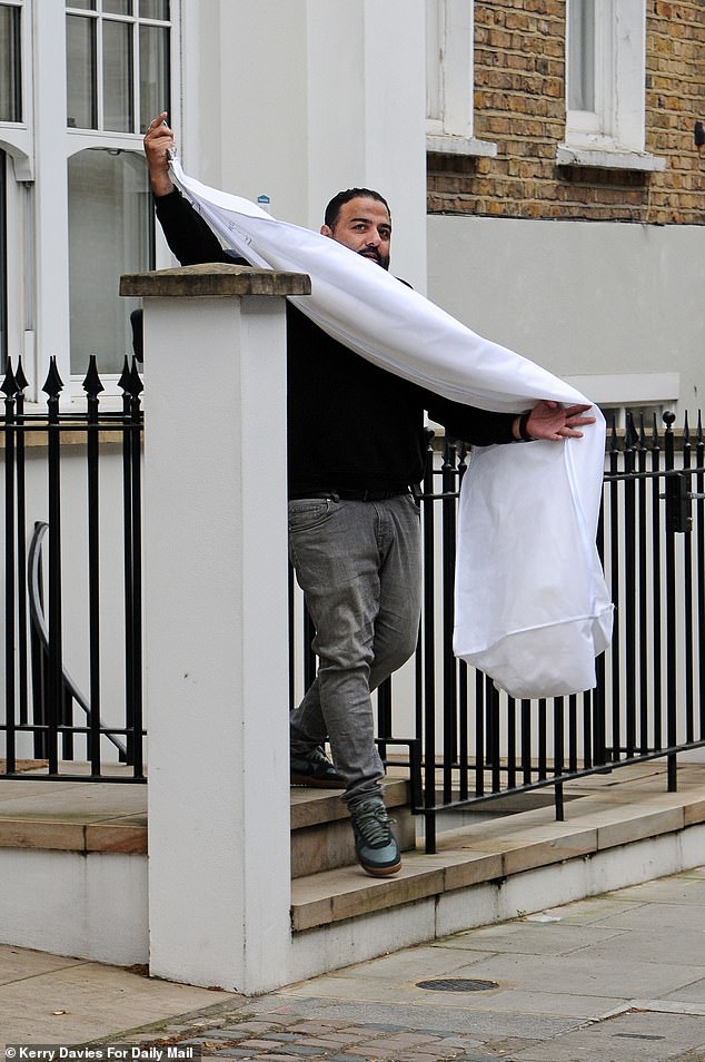 Preparations were in full swing as Roxy's bridal gown was seen being carried out to the awaiting taxi