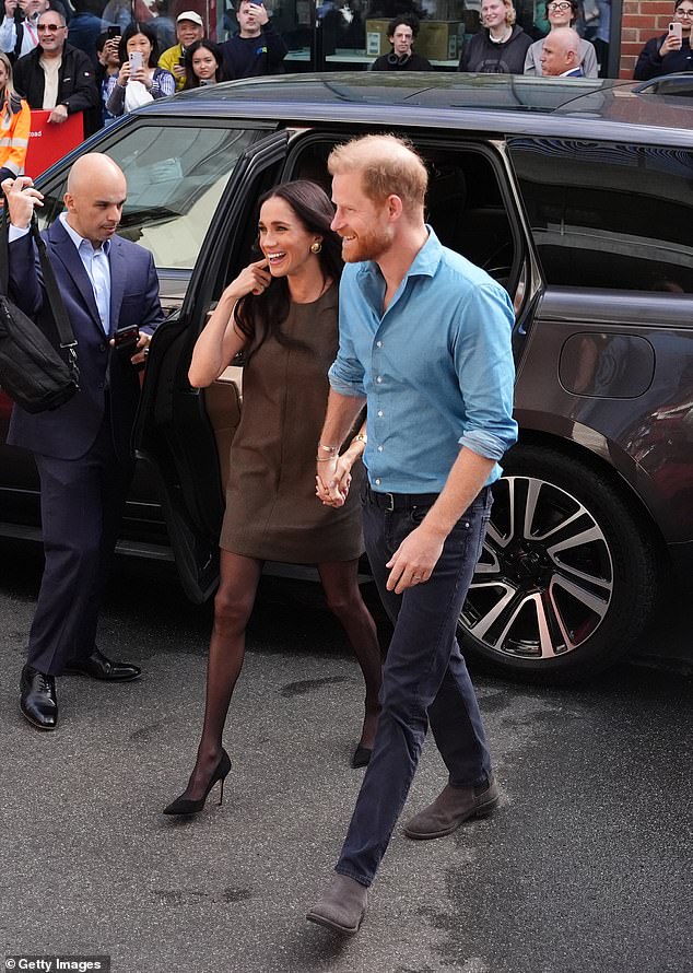 For her visit to Swinburne University, Meghan opted to wear the £286 'Anya' dress from Australian label Friends with Frank along with Wolford tights and Manolo Blahnik pumps