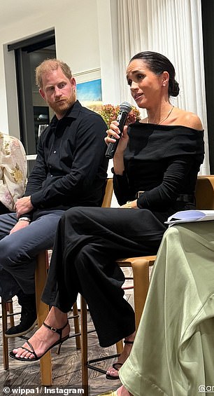 Pictured: The Duchess of Sussex wearing a black ensemble at an event