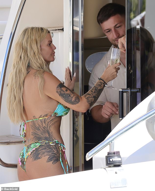 Paolo was on duty to fill Kerry's champagne glass as she celebrated her son's birthday milestone