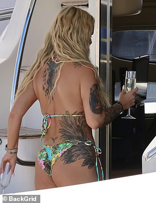 Kerry looked sensational as she strolled along the deck