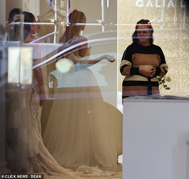 She looked sensational as she showed off the gowns to her friends