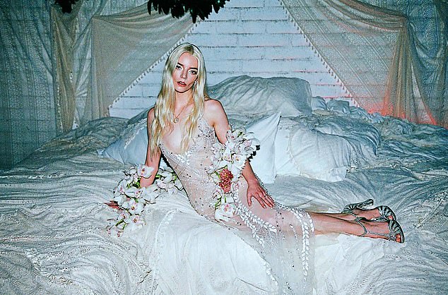 The Emma actress wore a tulle gown with floral embellishments, made by Rodarte in the US
