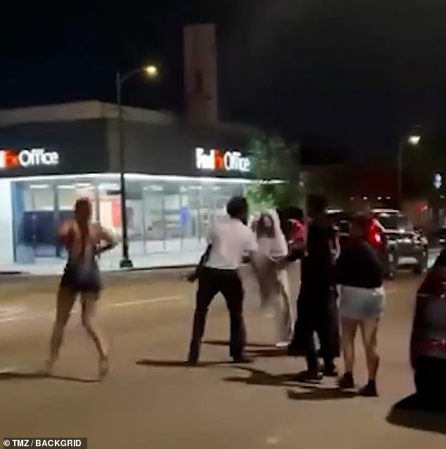 In video obtained by the Daily Mail, the fight could be seen to continue outdoors, where Ice Spice was flung to the ground during a scrap in the middle of the street