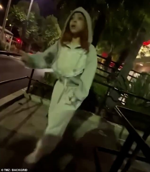 As other people tried to keep them apart, Ice Spice and the man started screaming at each other and she bellowed: 'Or your mama, let me fight her!'