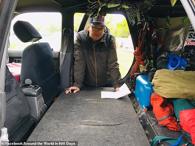 They documented the whole experience on their website and social media pages, called Around the World in 800 Days, as well as on an associated podcast. Pictured: Mr Smith, with the pair's car