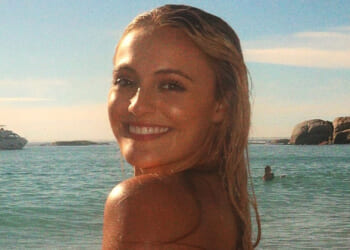 Glamorous British athlete Lauryn Davey sizzles in multicoloured bikini as fans crown her 'goddess of the sun'