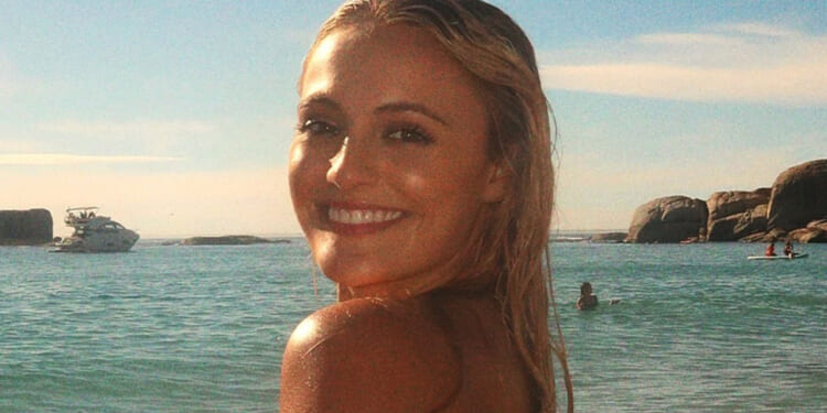 Glamorous British athlete Lauryn Davey sizzles in multicoloured bikini as fans crown her 'goddess of the sun'