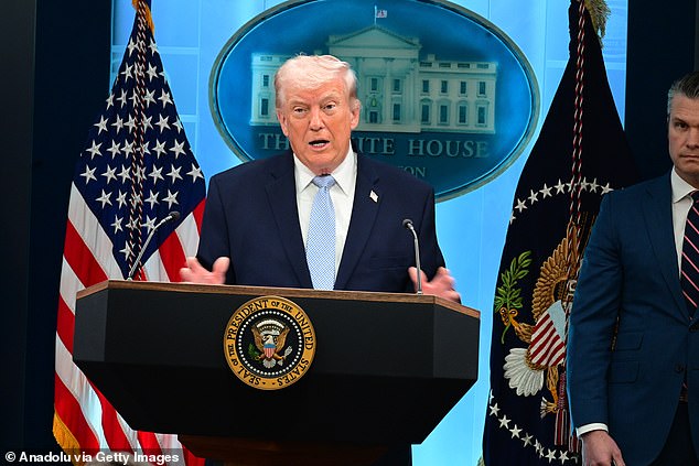 Trump, pictured above on April 6, reportedly came up with the controversial 'Praise be to Allah' post on his own, according to new reporting