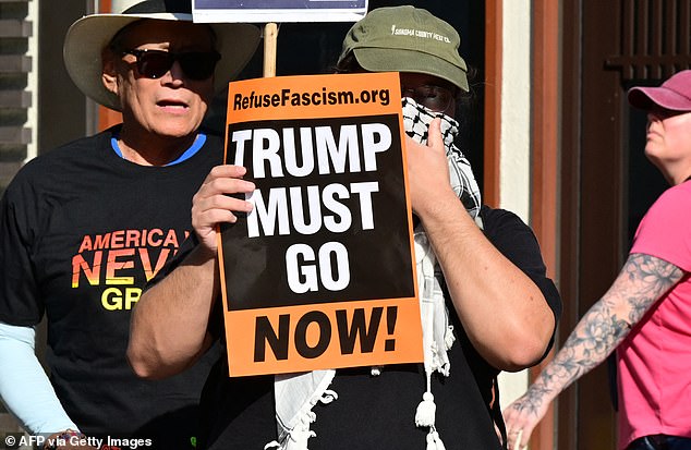 Trump's military crusade in Iran has caused widespread backlash. Pictured above are protesters at a demonstration in Los Angeles on April 7