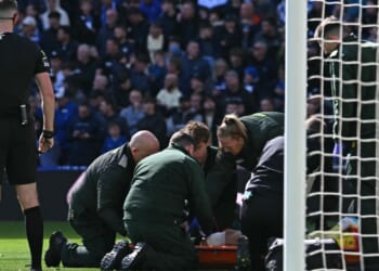 Liverpool star Giorgi Mamardashvili stretchered off at Everton as Arne Slot is forced to turn to third goalkeeper