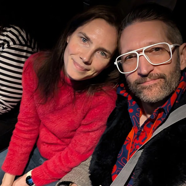 She is in the city promoting a new film directed by her husband, Christopher Robinson (pictured), which follows her return to Perugia