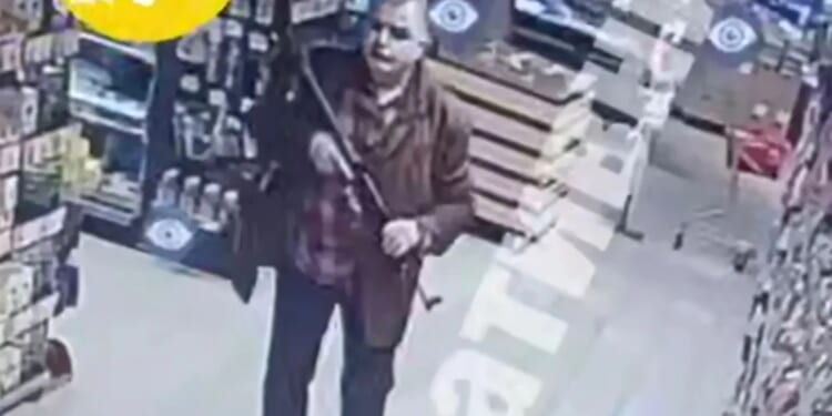 Ukrainian police chief RESIGNS after fury over 'unprofessional' officers who 'fled' as gunman killed 6 in Kyiv attack