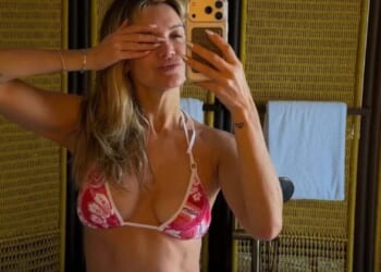 Ashley Roberts stuns in tropical pink bikini and lounges on sand as she enjoys luxury Maldives break after I'm a Celeb