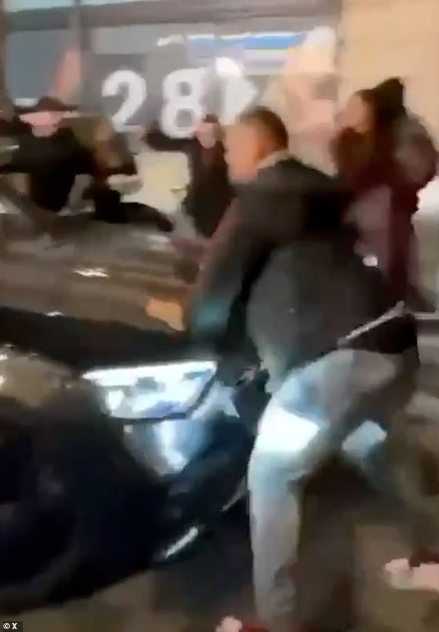 Video circulating online captures the terrifying moment a car drives into a group of people