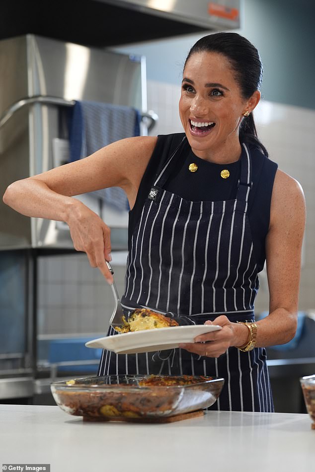 Foodie Meghan, Duchess of Sussex, serves frittata at McAuley Community Services for Women, a women's homeless and family violence shelter, on April 14 in Melbourne