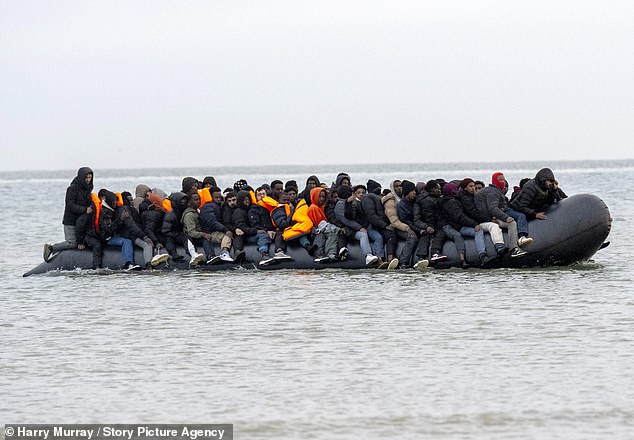 Farage said if he became prime minister he would have the cases of 400,000 people granted asylum over the previous five years reviewed and revoke permission to remain for those who arrived illegally or overstayed their visas. Pictured: Migrants attempted to cross the channel from France last week