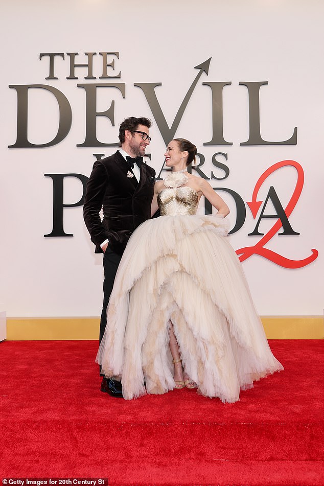 The pair, who have been married since 2010, gave each other a tender look while posing on the red carpet