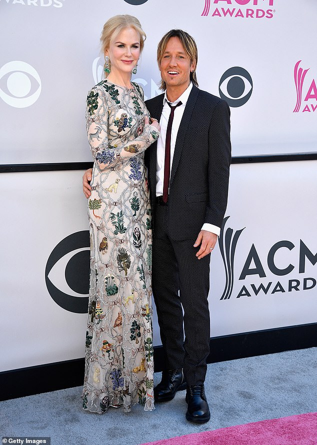 Sunday showcased a lovely gray–blue lace dress just months after her parents' divorce was finalized in January. Urban and Kidman split in September 2025 after nearly 20 years of marriage; seen together in 2017 in Las Vegas