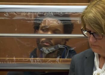 D4vd, real name David Anthony Burke, is pictured at his first court appearance on Monday