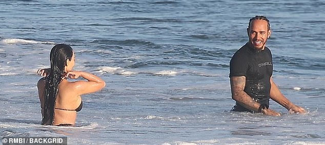 Hamilton shot his new lady love a sweet smile