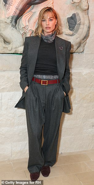 Australian actress Margot, 35, cut a stylish figure during the bash