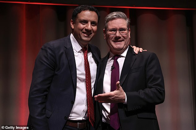 Scottish Labour leader Anas Sarwar yesterday continued his calls for Sir Keir to resign, telling the BBC there had been 'far too many missteps' and the 'tipping point' had been the Mandelson scandal Pictured: Sir Keir stood on stage with Mr Sarwar at the Scottish Labour Party Conference held in Edinburgh in 2023