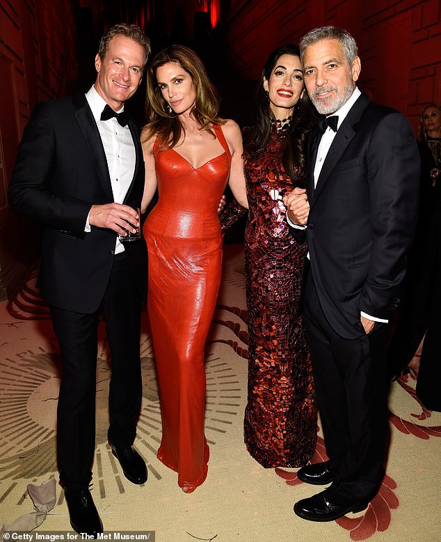 Gerber, Crawford, Amal Clooney and George Clooney at the Met Gala 2018 in New York City