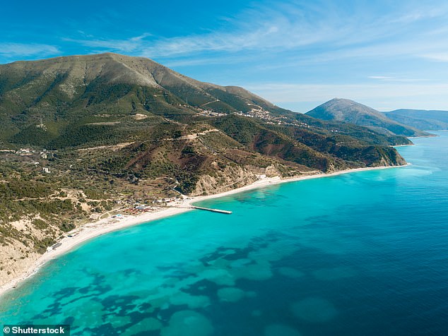 The long pebble beach of Plazhi i Bunecit offers clear waters and a concrete pier, provides a popular spot for jumping into the sea