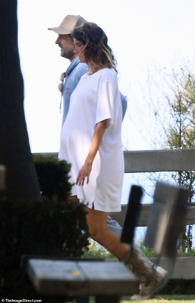 The 54-year-old actor looked cozy in a baby blue sweatshirt and beige baseball cap, adding grey sweatpants