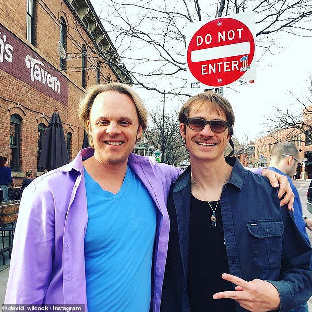 Wilcock had more than 500,000 followers on YouTube alone, He is pictured with a superfan in Boulder, Colorado