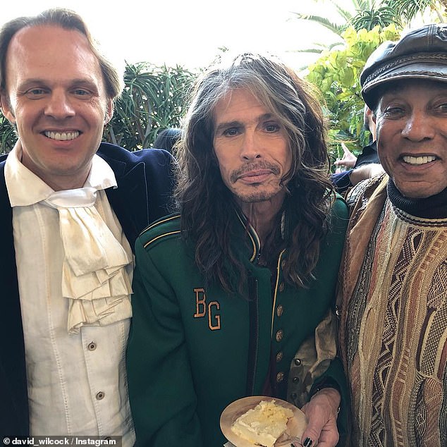 Wilcock is pictured alongside Aerosmith's Steven Tyler and Motown legend Smokey Robinson