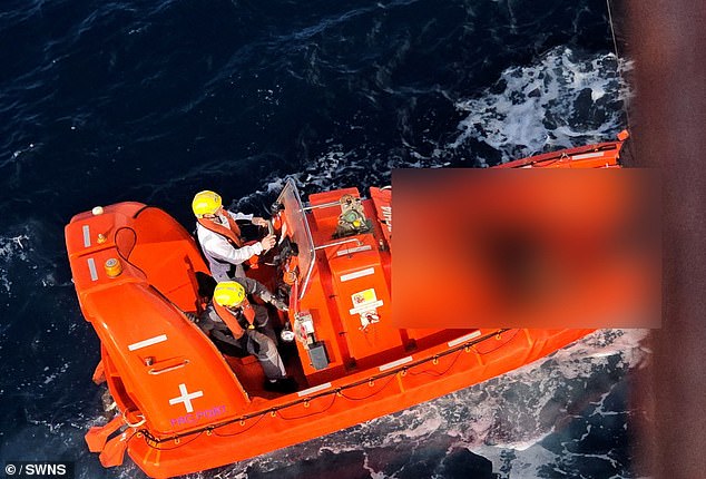 The victims, believed to be migrants, were spotted after an orange life jacket was seen floating in the water, forcing the ship to divert