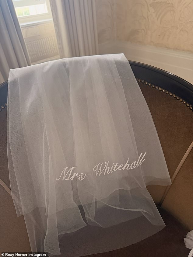 Roxy also shared glimpses of her wedding day look as she pictured her 'Mrs Whitehall' embroidered veil draped over a chair