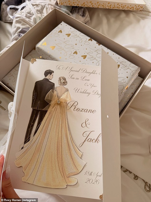 Roxy shared a look at a personalised card from her parents as the couple opened their gifts from loved ones