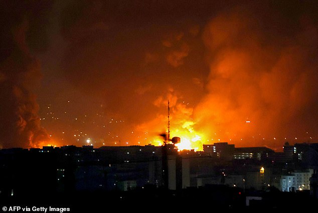 Smoke and fire rise from the site of US-Israeli airstrikes in Tehran