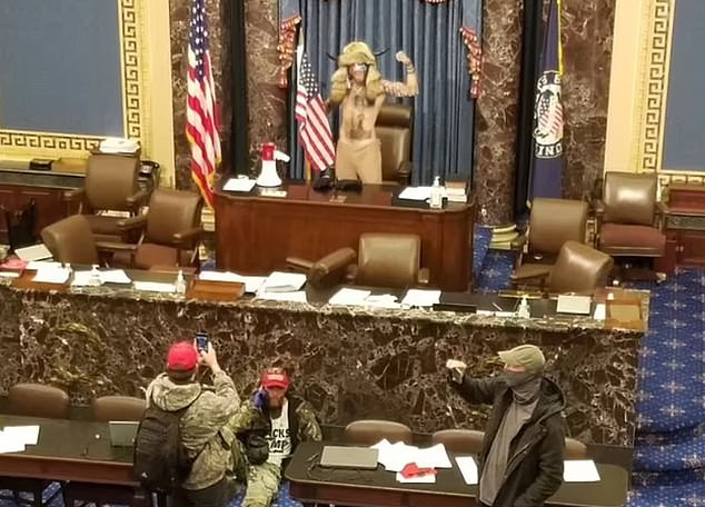 The prominence of Angeli, above in the Senate chamber during the riot at the US Capitol, helped make him instantly recognizable among the so-called J6ers