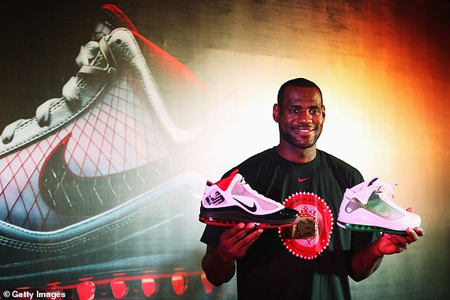 The brand is being hit by a triple whammy: backlash to its more ‘woke’ image shift, a failed retreat from major retail partners in favor of direct-to-consumer selling, and a deepening slump in China (pictured: LeBron James holding Nike sneakers)
