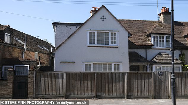 The £500,000 three-bedroom cottage next to Laleham's war memorial bought by a businessman from north London who turned it into a House of Multiple Occupation (HMO) to house asylum seekers