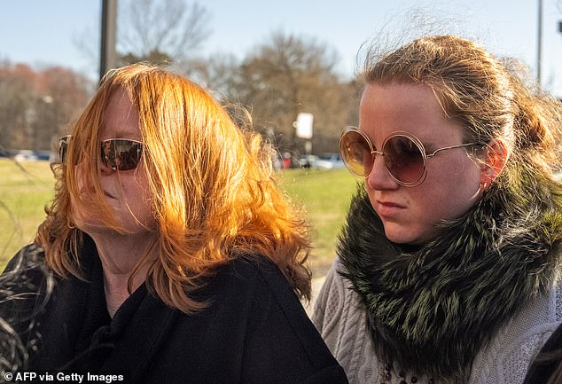 Asa Ellerup, the estranged wife of Heuermann, and their daughter Victoria, outside Suffolk County Court on April 8 - the day their family member would plead guilty