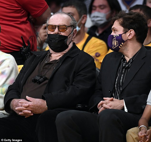 Many of his outings have been to LA Lakers game with his son Ray; seen in 2021