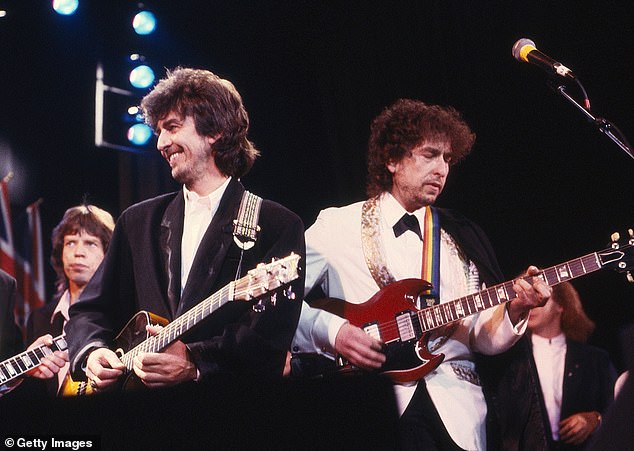 Mick Jagger, George Harrison and Bob Dylan in 1988