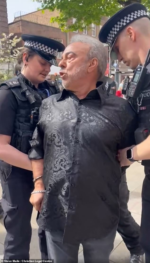 The arrest is on suspicion of assault and racially or religiously aggravated disorderly behaviour