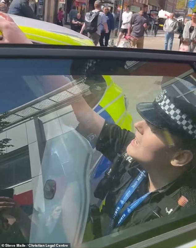 Mr Maile asks the officer to remove his handcuffs because is in pain, but she closes the door