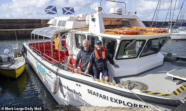 Lex, captain of the Seafari Explorer, and tour guide Cat Johnson, who run daily tours to Bass Rock & Craigleith, which lie near to North Berwick