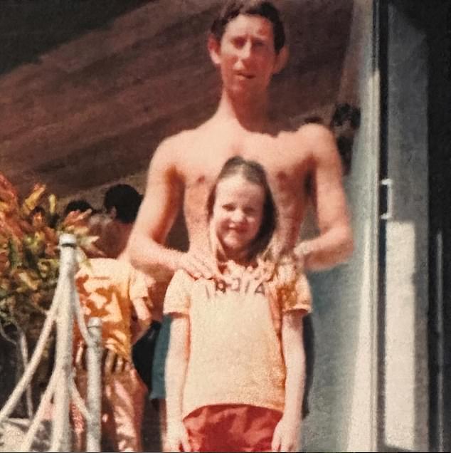 The designer and former model pictured with the then-Prince of Wales when she was a child
