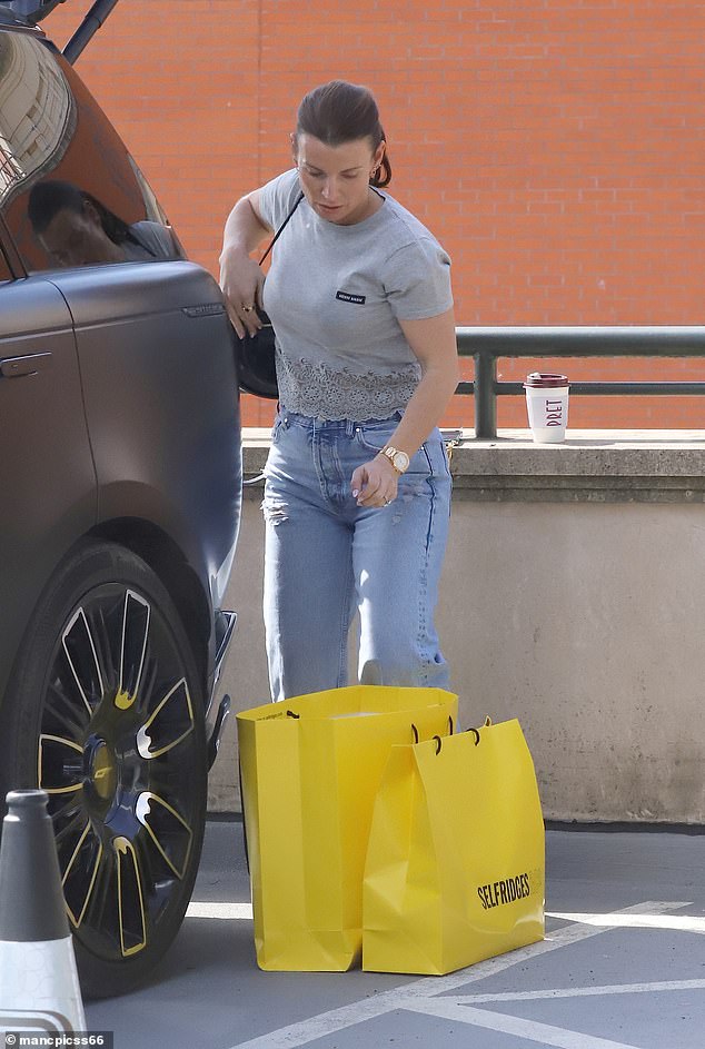 For the mother-son outing, Coleen stepped out in a grey chic Miu Miu T-shirt, which she paired with blue jeans