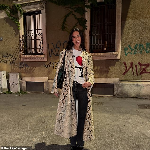 Another look shared in the snap showed Dua wearing a crocodile print coat with an 'I [heart] NY' t-shirt and black jeans
