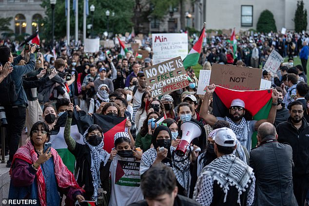 Immigration officers were told to focus on 'aliens who engaged in on¿campus anti¿American and antisemitic activities.' Picture of a pro-Palestine protest at Columbia University