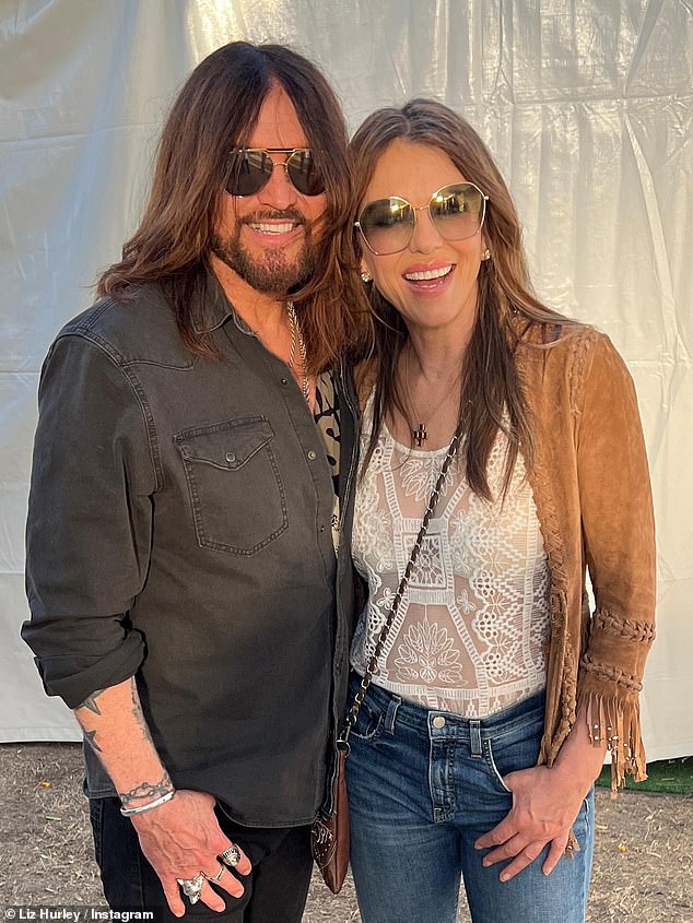 Liz posed for snaps backstage with Billy Ray after the set as she gushed over his performance, with the pair also seen sharing a kiss